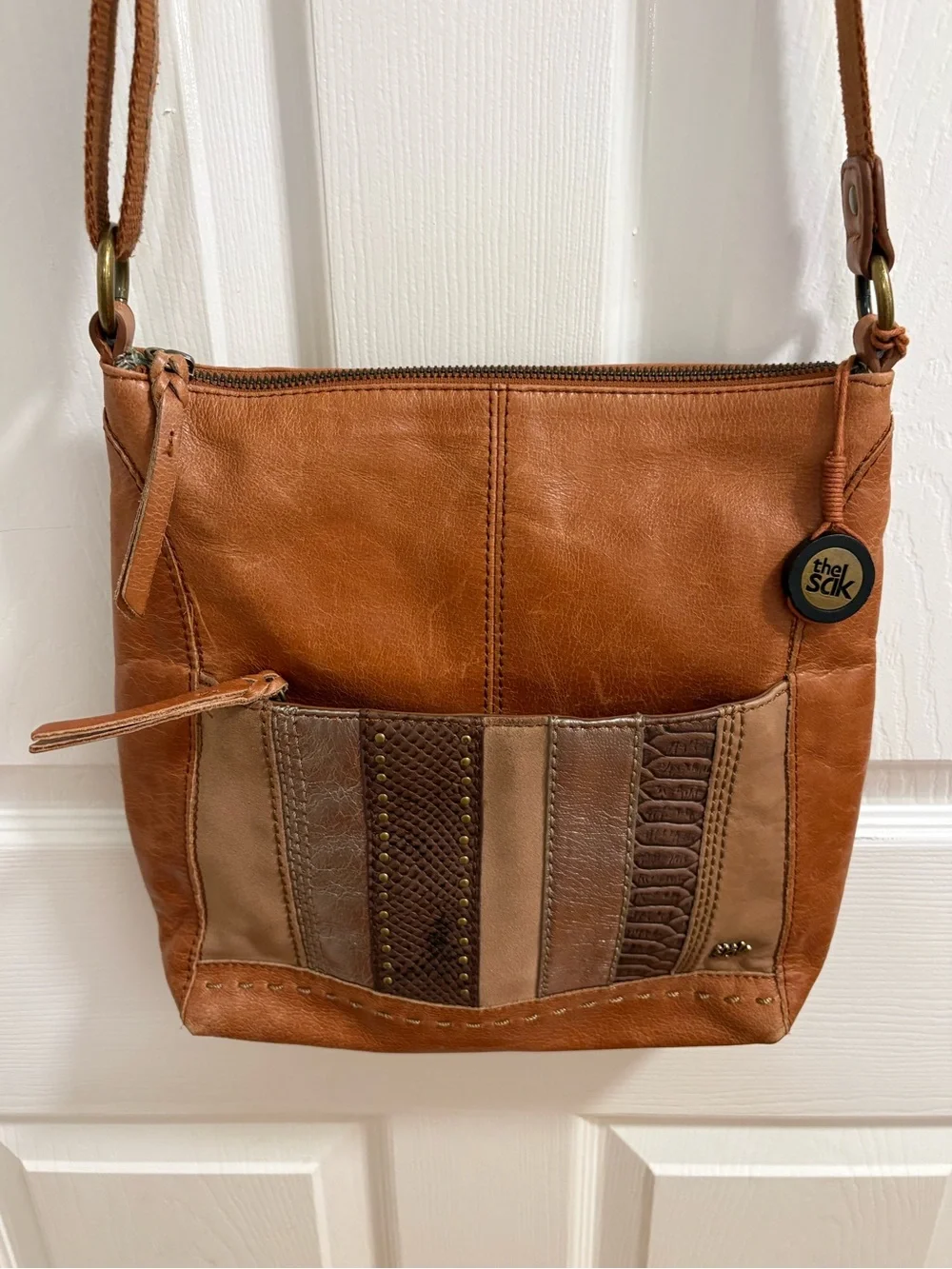 The Sak Iris leather crossbody bag in tan and brown, vintage